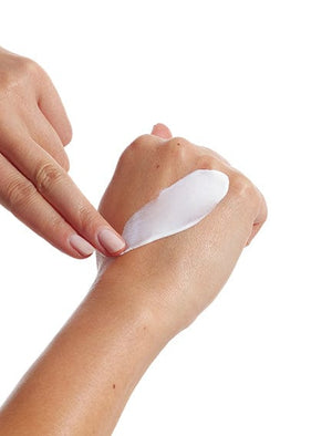 Swatch of Face Fluid Sunscreen on back of the hand