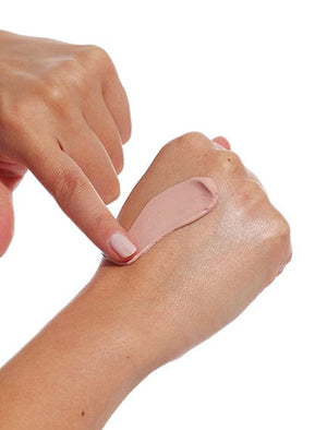 Swatch of Tinted Hydrating Sunscreen Lotion that dries to an invisible finish on the face