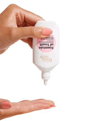 squeeze of fountain of youth serum onto fingers