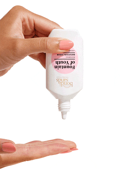 squeeze of fountain of youth serum onto fingers