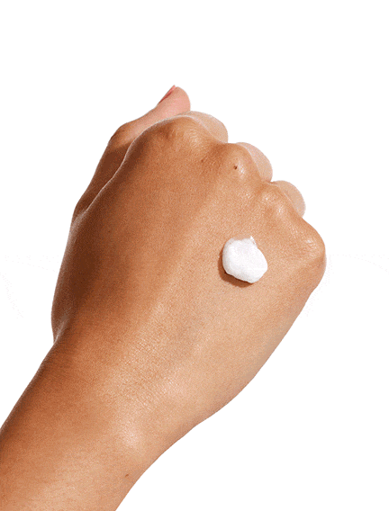 Swatch of sweet dreams night time moisturiser on the back of hand