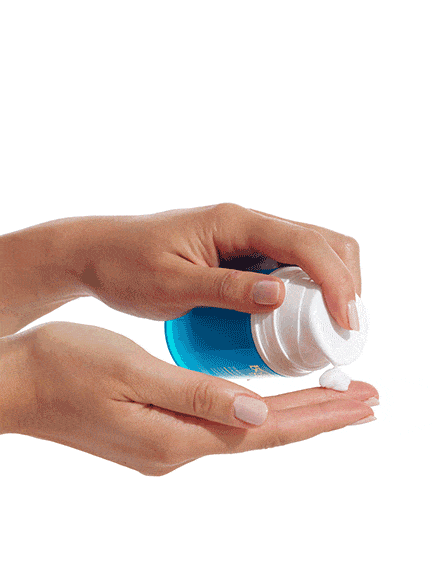 Pump of Gradual Tan Face Lotion onto hands