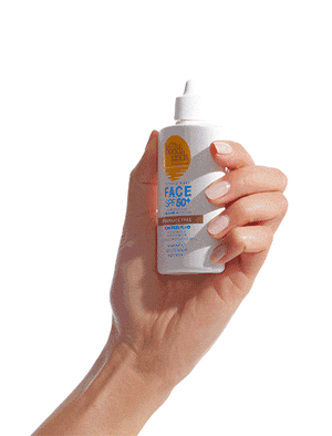 Hand holding Face SPF 50+ Sunscreen Fluid
