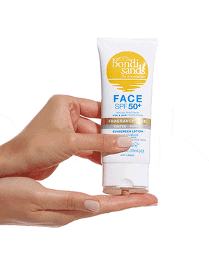 Squeeze of tinted matte finish face sunscreen lotion onto hands